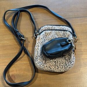 Brown and Black Crossbody Bag with Textured Material and Adjustable Strap